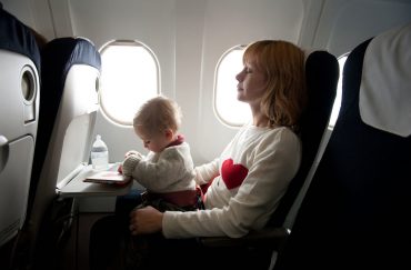 Mother and baby in the plane