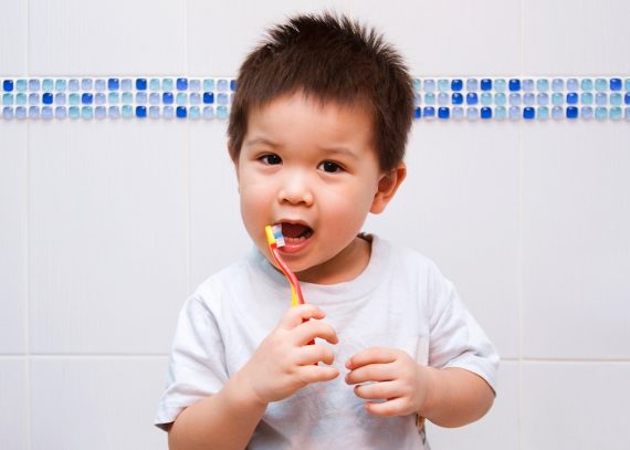 Toddler brushing teeth