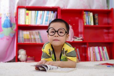 Kid enjoys books