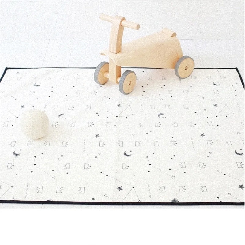 flat play mat with wheeled toy