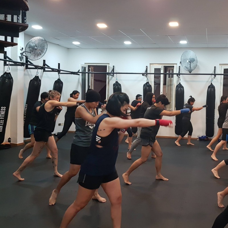 women boxing in a group