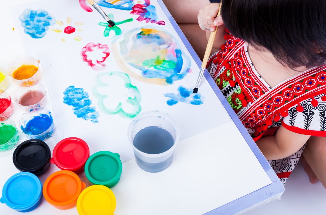 little girl painting