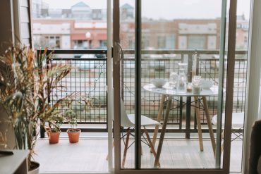 unsplash balcony with table and chairs