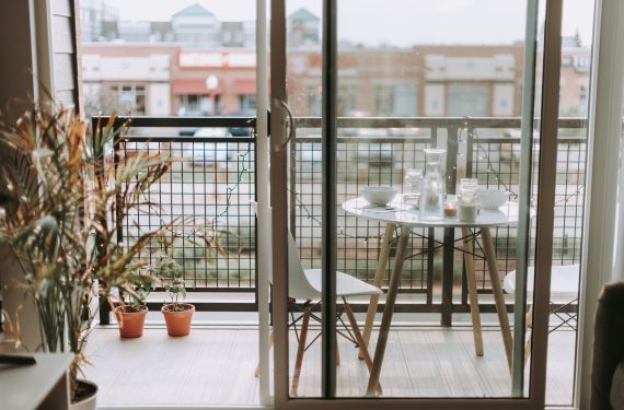 unsplash balcony with table and chairs