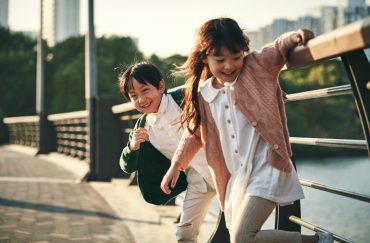 children playing outdoors siblings brothers and sister